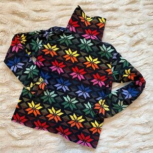 Rainbow Nordic style turtleneck by Hanna Andersson. ⭐️🌈
